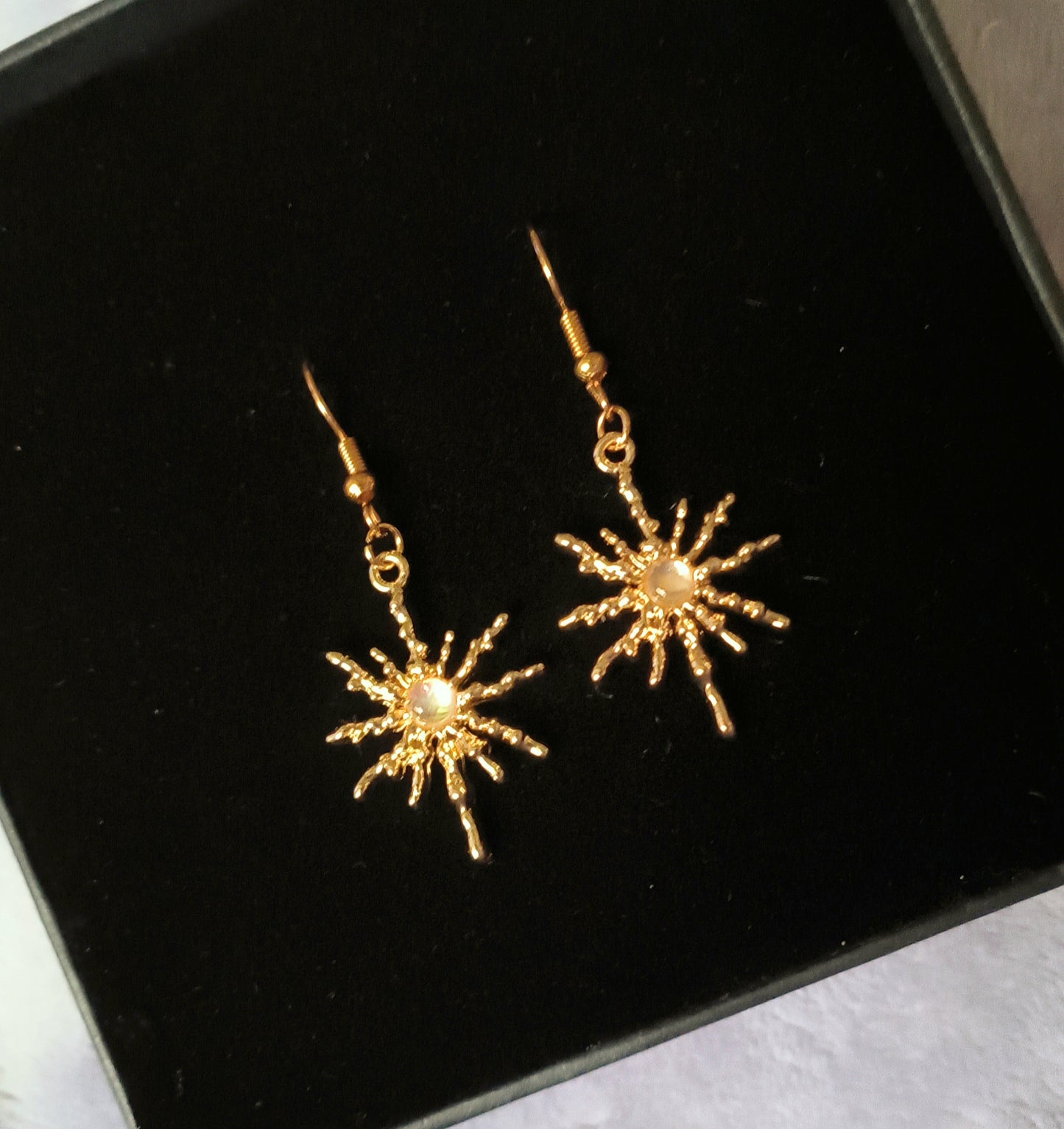 Star dangle and drop earrings