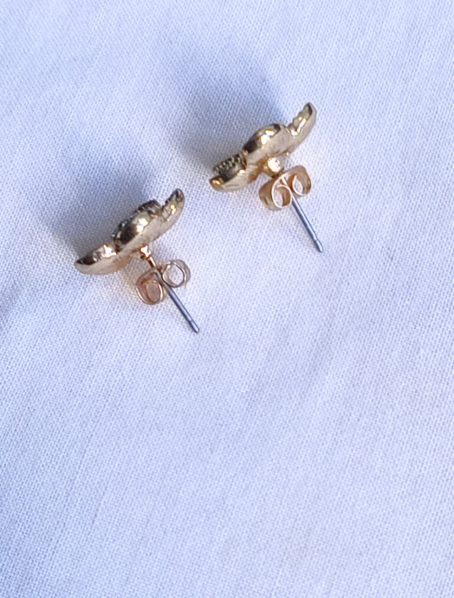 Gold flower stud earrings