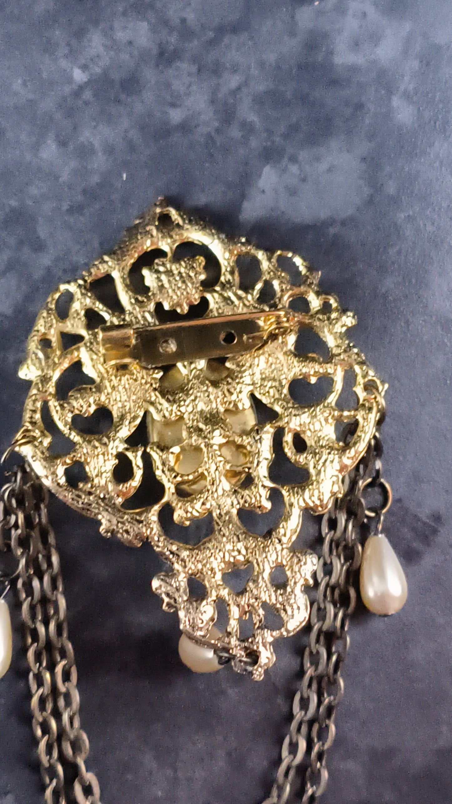 faux pearl brooch