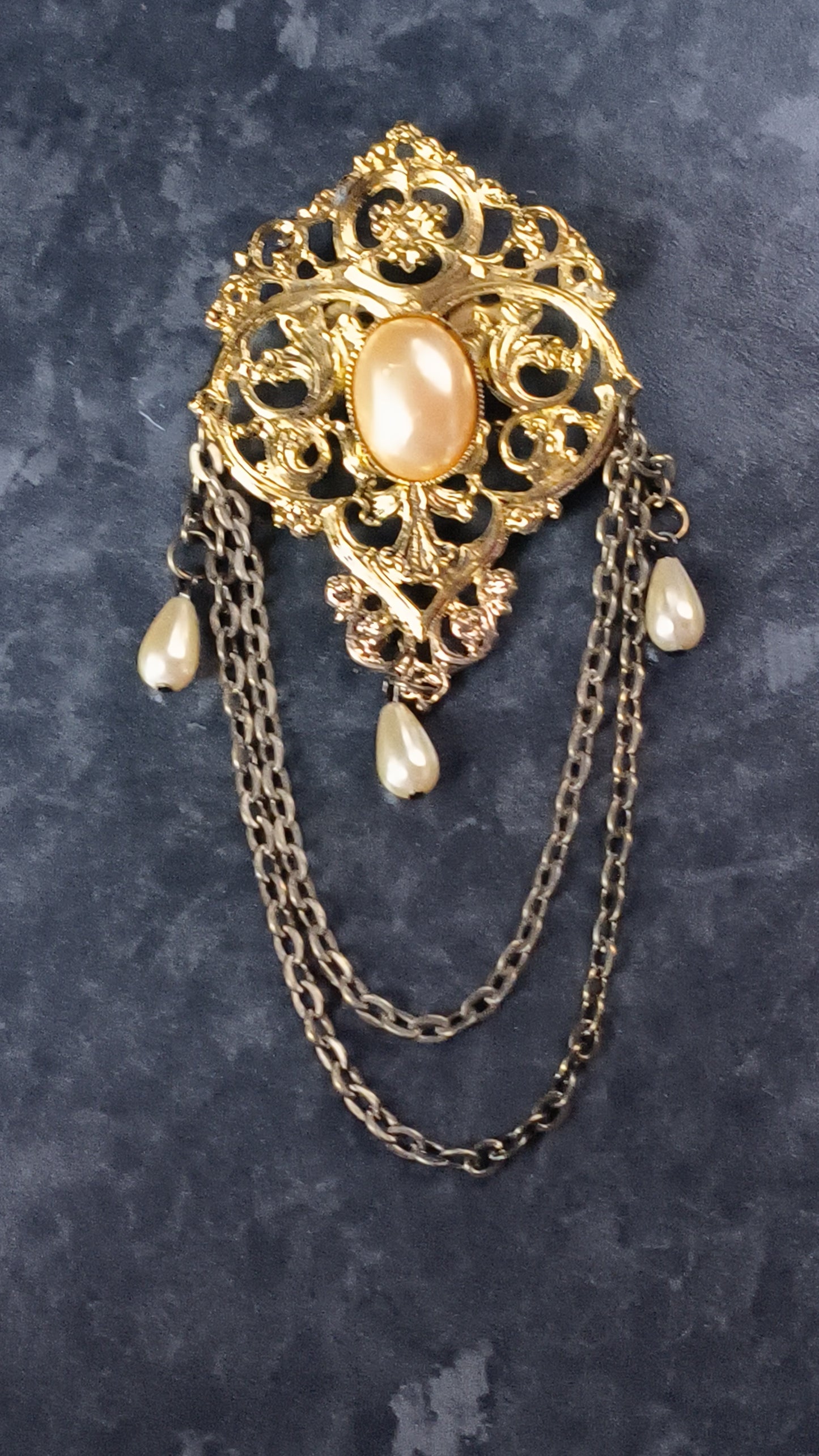 faux pearl brooch